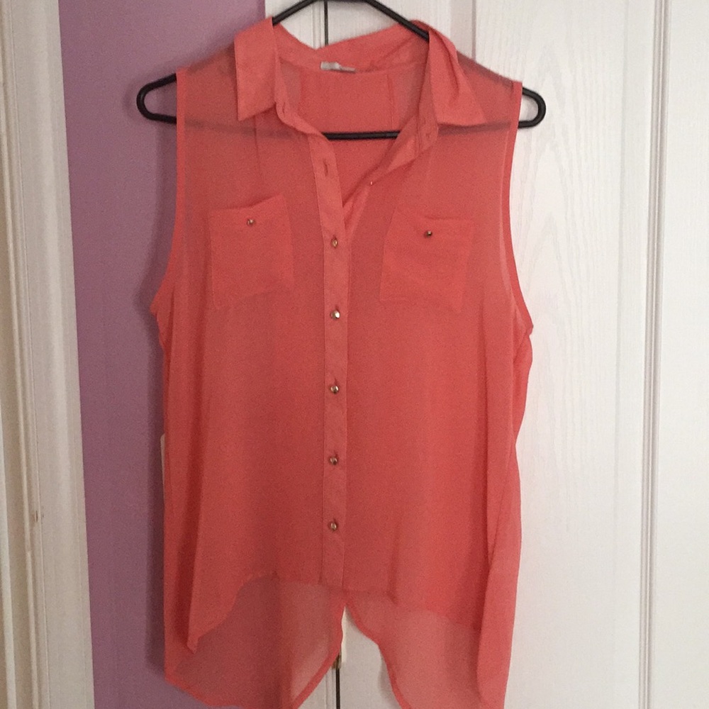 Salmon color chiffon tank top with high low style.